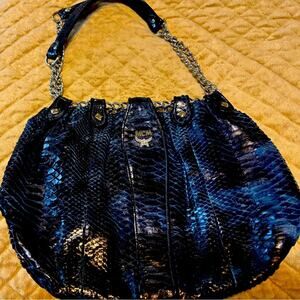 Black/blue snake skin MCM purse